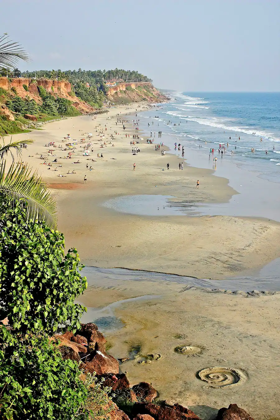 Varkala beach and its red cliff above the Arabian Sea.